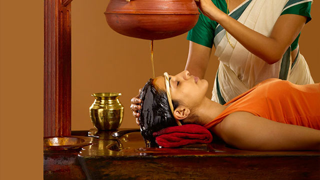Traditional Ayurvedic oil treatment